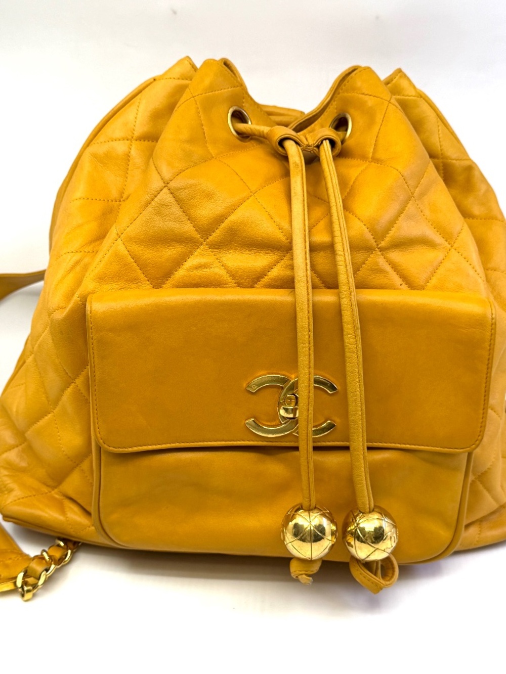 Authentic Chanel Drawstring Backpack, Yellow color Quilted Leather